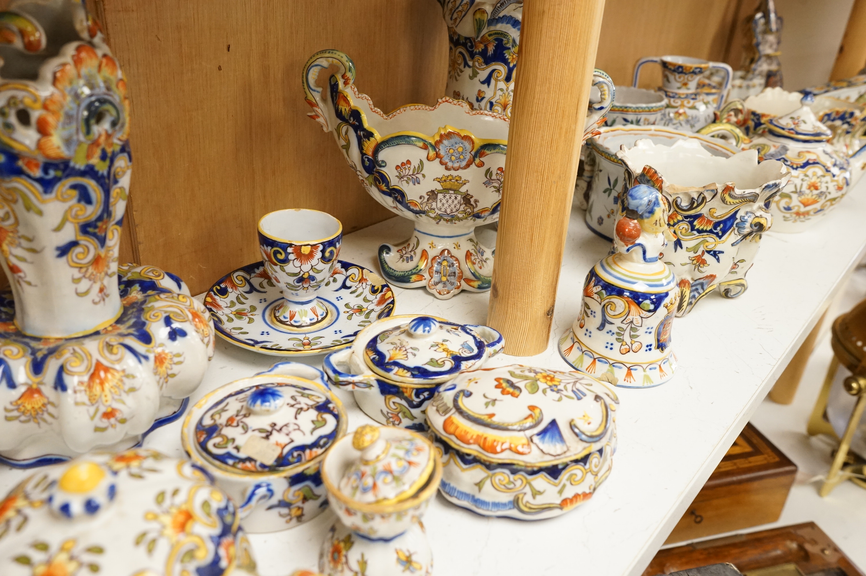 A group of French faience pottery to include trinket boxes, a teapot and vases, largest 32cm in length